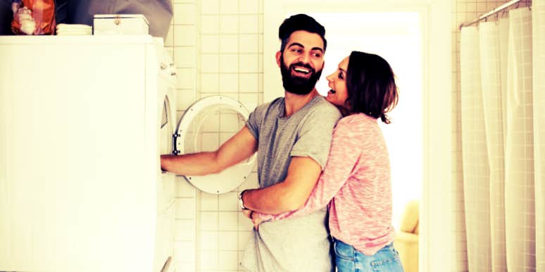 woman hugging husband for helping around the house