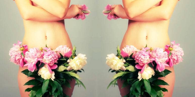 What The Perfect Vagina Looks Like, According To Men woman with flowers covering her vagina