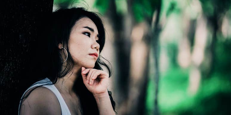 Signs You're A Physical Empath & Ways To Protect Yourself woman thinking