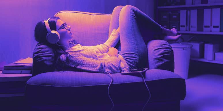 woman sleeping with headphones on