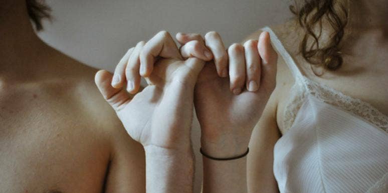 couple holding hands couple holding hands