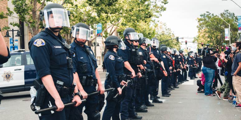 Experts Explain Why 2020 Was The Deadliest Year For Gun Violence — And 2021 Is Trending Even Worse police in line