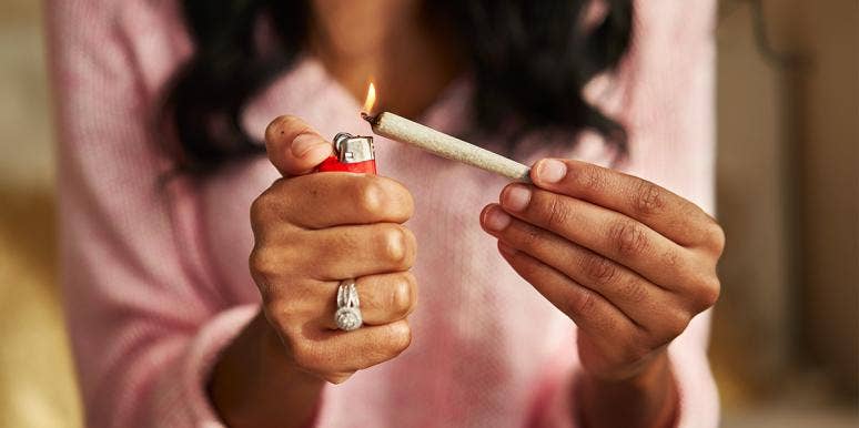 I'm A Christian Mom Of Two Who Just Wants To Smoke Pot close-up of woman lighting up