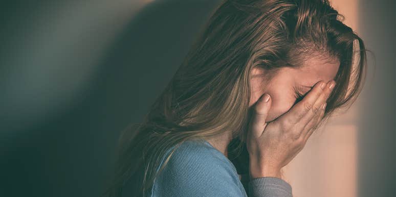 unsexy ways heal broken heart woman with head in hands