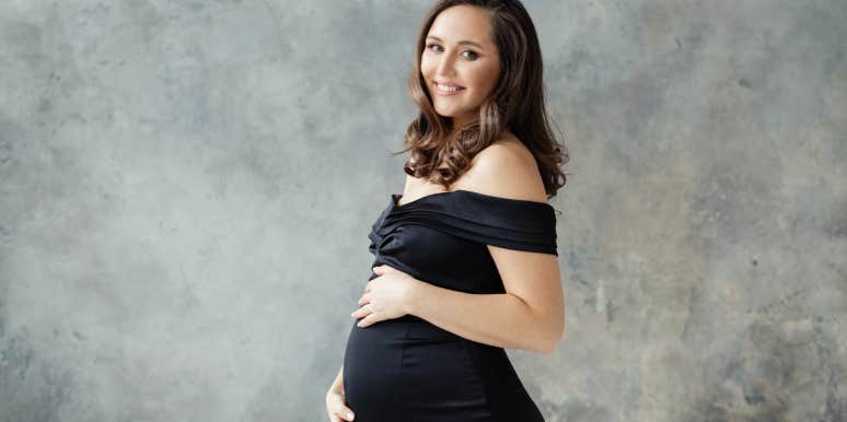 Pregnant woman in black dress
