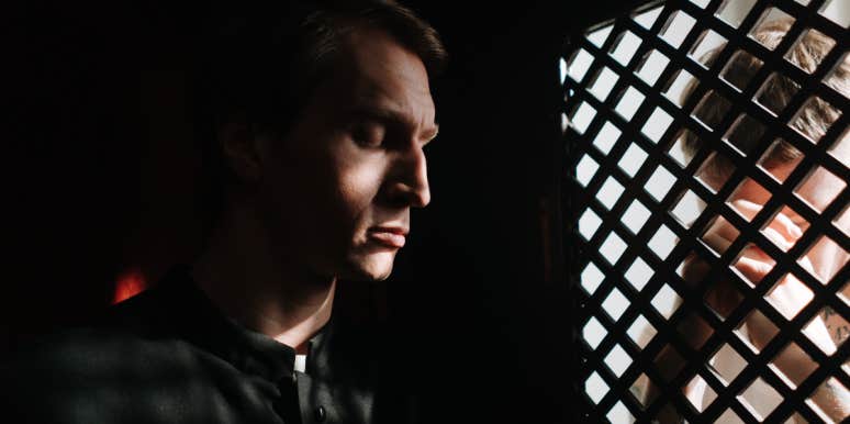 Woman Considering Legal Action After Priest Tells Her Husband About Her Affair Following Confession Priest in confessional