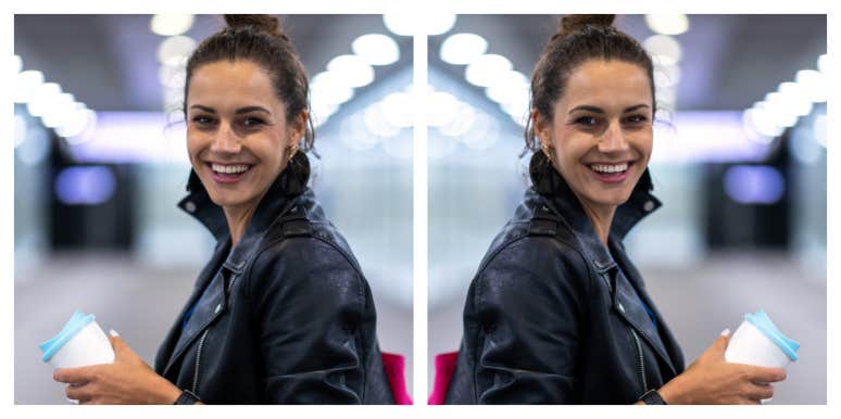 how to stop procrastinating and be productive woman standing in a bright hallway, smiling