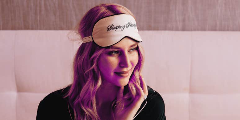 How To Subconsciously Reprogram Your Mind 5 Minutes Before Sleep, According To Wayne Dyer woman with sleep eye mask in bed
