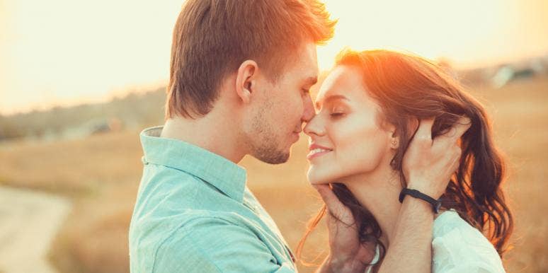 A Psychic Gave Me Relationship Advice That My Friends Couldn't man and woman kissing