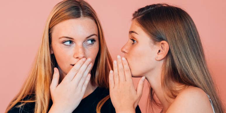 The Psychological Trick That Reveals What Your Friends Subconsciously Think Of You women whispering and covering their mouths