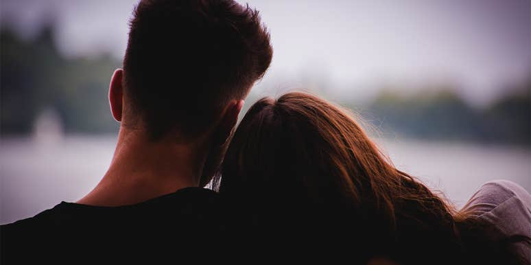The Real (Sad) Reason Women Can't Change The Men They Love woman leaning on man