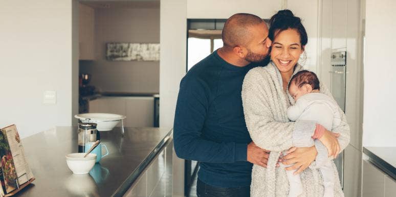 Parents: The Sweet Reason Your Kids Need To See You Act Lovey-Dovey With Your Spouse parents being affectionate with baby