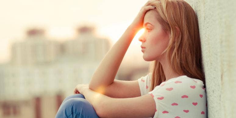 The Real Reason Women Turn A Blind Eye When Their Men Cheat woman touching hand to forehead
