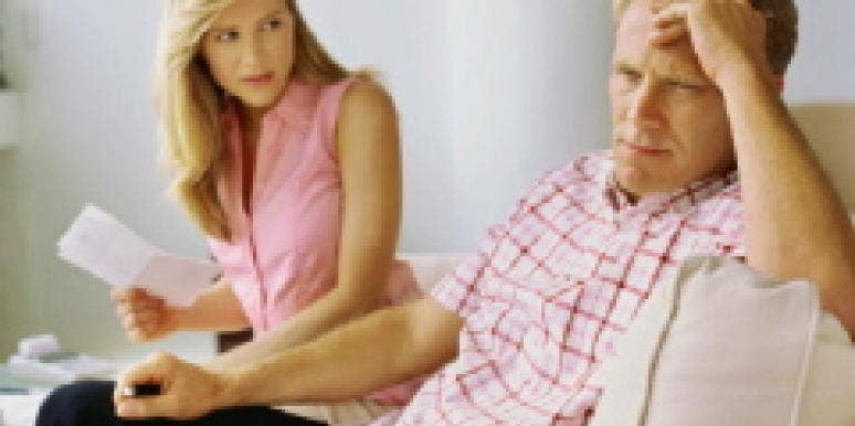4 Ways To Avoid Fighting About Money Couple exasperated over bills