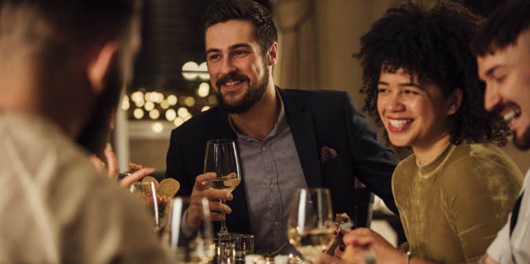 Wife Wonders If She Was Wrong For Skipping Husband's Big Promotion Dinner Because She Didn't Like The Menu group of friends eating at a restaurant