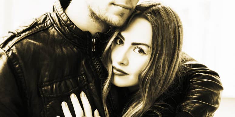 How to regain trust after you betrayed them woman looking at camera, hugging man, black and white image