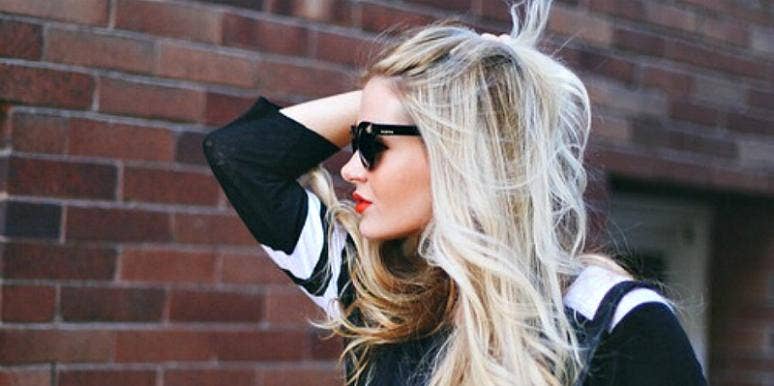 Blonde Girl with Sunglasses on 