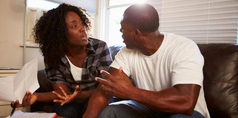 The 6 Most Common Things Couples Argue About When It Comes To Finances arguing couple