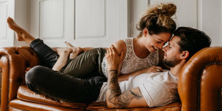 10 Ways To Know For Absolute Sure Your Relationship Is Right For You wife and husband cuddling on couch