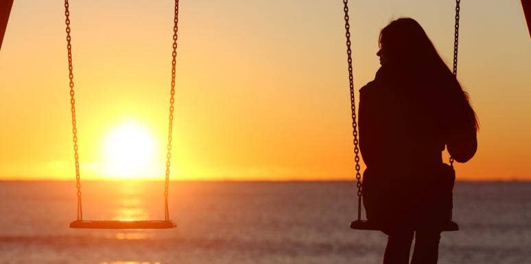While I Relearn How To Love, All I Ask For Is Patience woman sitting swing sunset