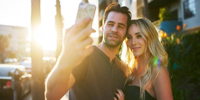 remarriage couple taking selfie