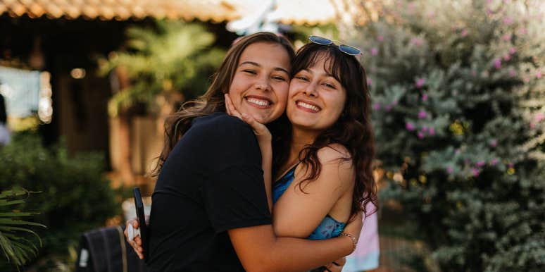 A Simple Reminder to Give Your Sibling A Hug sisters hugging