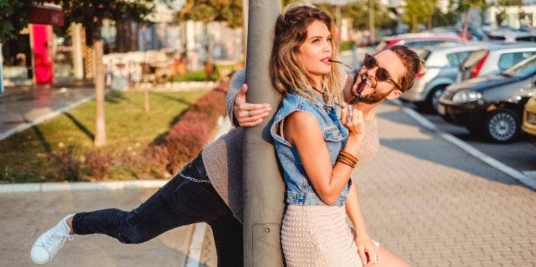 The Role Of Chemistry Between People In Real Love man and woman laughing and joking on the street