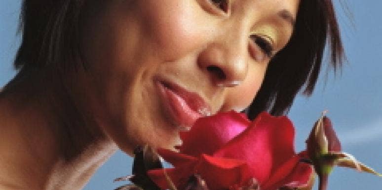 Why Do Flowers Make Us Swoon? woman smell rose