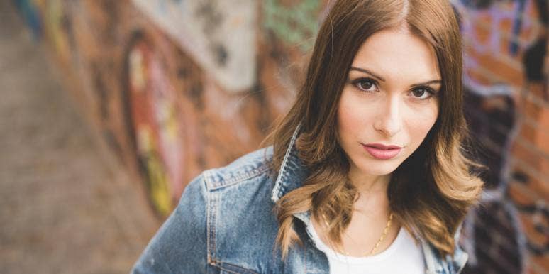 13 Rules To Follow If You Think You're In Love With A Sociopath woman in jean jacket looking at camera