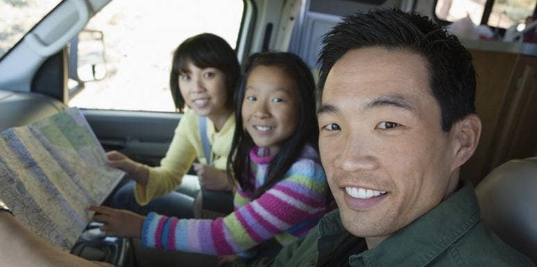 RVShare Family looking at map in RV