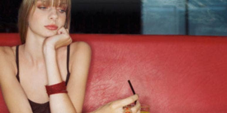 sad woman drinking alone at bar sad woman drinking alone at bar