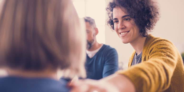 What Is A Savior Complex & 9 Signs You Have One woman trying to comfort