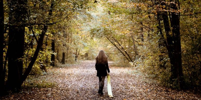 The Reality Of Saying Goodbye To The Love Of Your Life woman walking away from the past