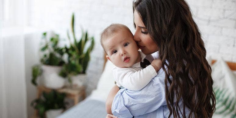 The One Secret Fear All Moms Are TERRIFIED To Admit mom holding baby