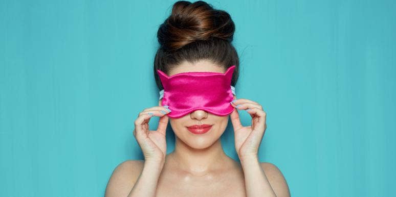 10 Common Sex Dreams & Their Meanings woman with blindfold on