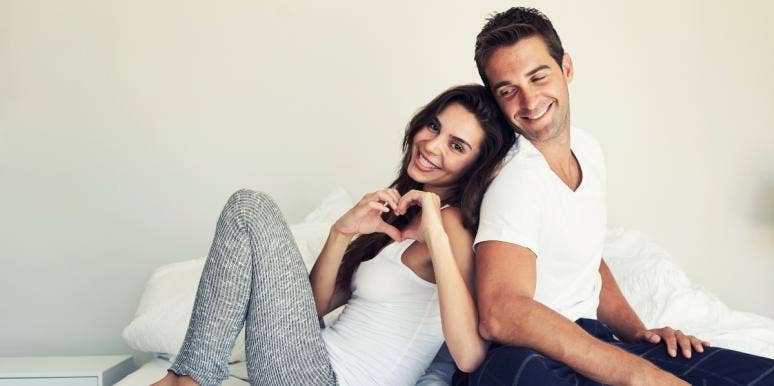 sex talk in relationships couple wearing white in bed