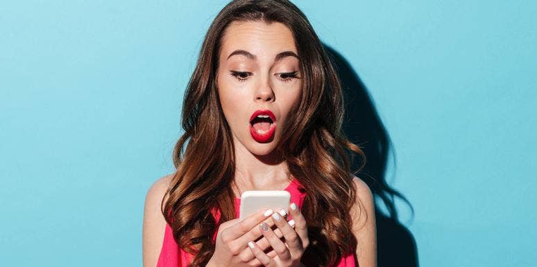 125 Random Fun Facts So Interesting You’ll Be Amazed Woman looking at phone shocked by fun facts