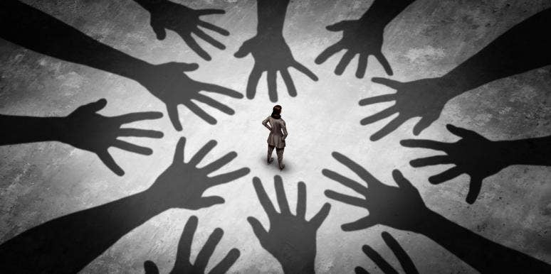 adhd and social anxiety woman standing alone with hands reaching for her