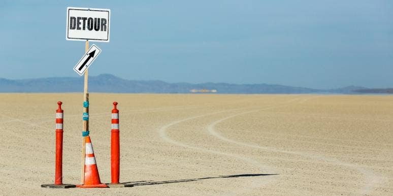 How Making Mistakes And Detours Takes You Closer To Success detour sign in the sand