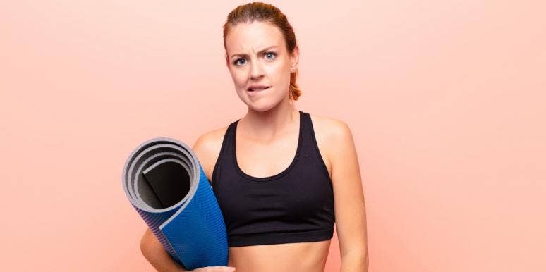 quit your day job uncertain woman with yoga mat