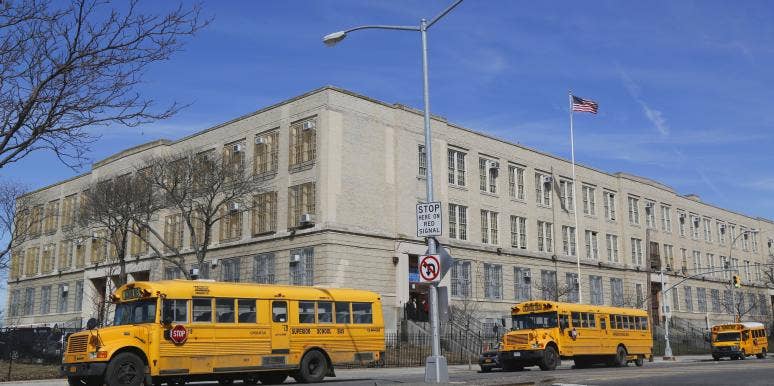school buses in front of school school buses in front of school