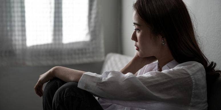 I Shut Down & Don't Talk To People For Days (Please Don't Take It Personally) woman sitting alone at home