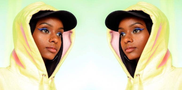 Signs Of Emotional Invalidation & What To Do If Your Partner Is Dismissive woman looking off into space after feeling emotionally invalidated