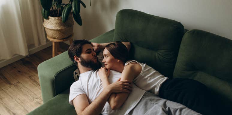 couple laying on the couch together