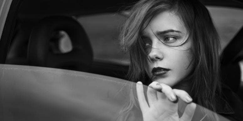 Signs Of A Psychopath & The Extremely Painful Aftermath Of Loving One sad woman in car