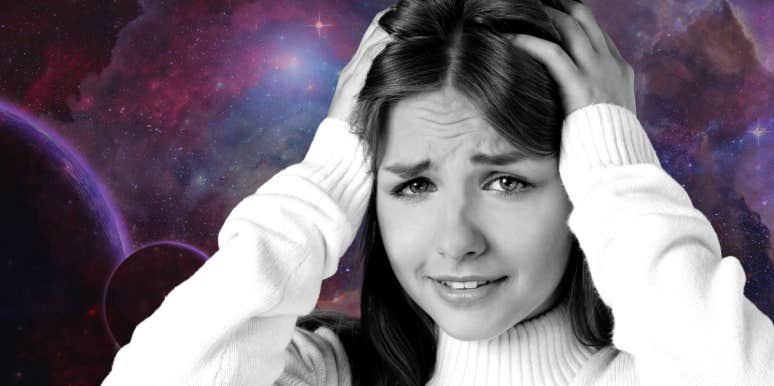 6 Signs The Universe Is Testing You woman with hands on head