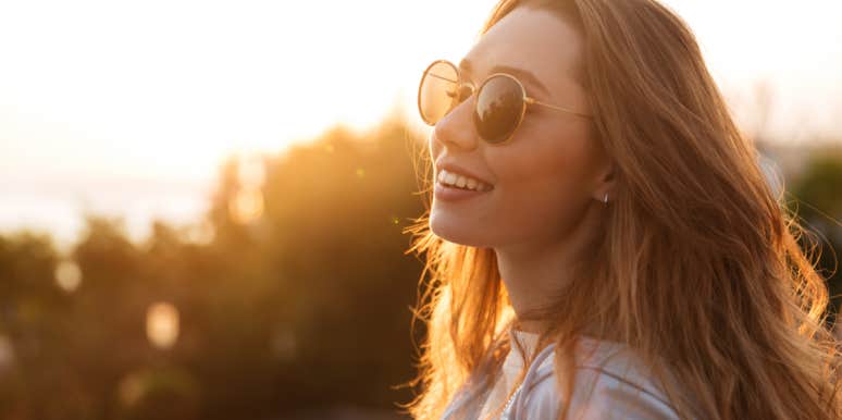 woman wearing sunglasses smiling