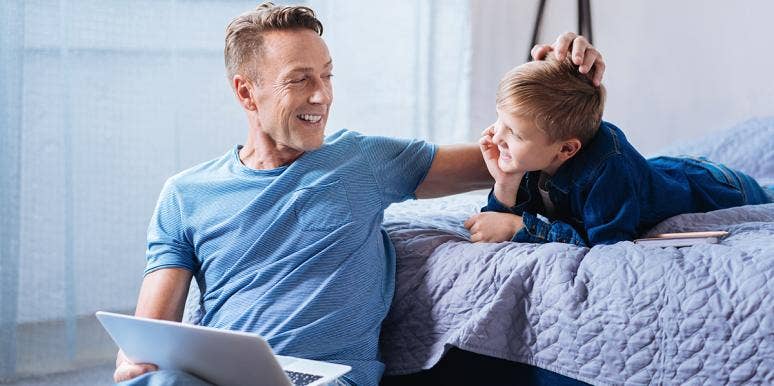 Whatever You Do, Don't Praise Your Kid By Using This Phrase dad and son chatting together