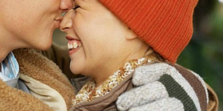 winter couple kissing on the nose winter couple kissing on the nose