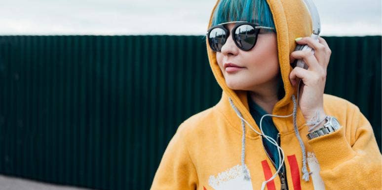101 Songs About Missing Someone You Love woman listening to headphones
